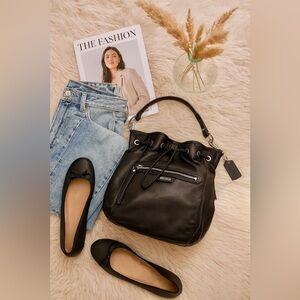 COACH Black Leather Drawstring Bag 
“pristine condition”